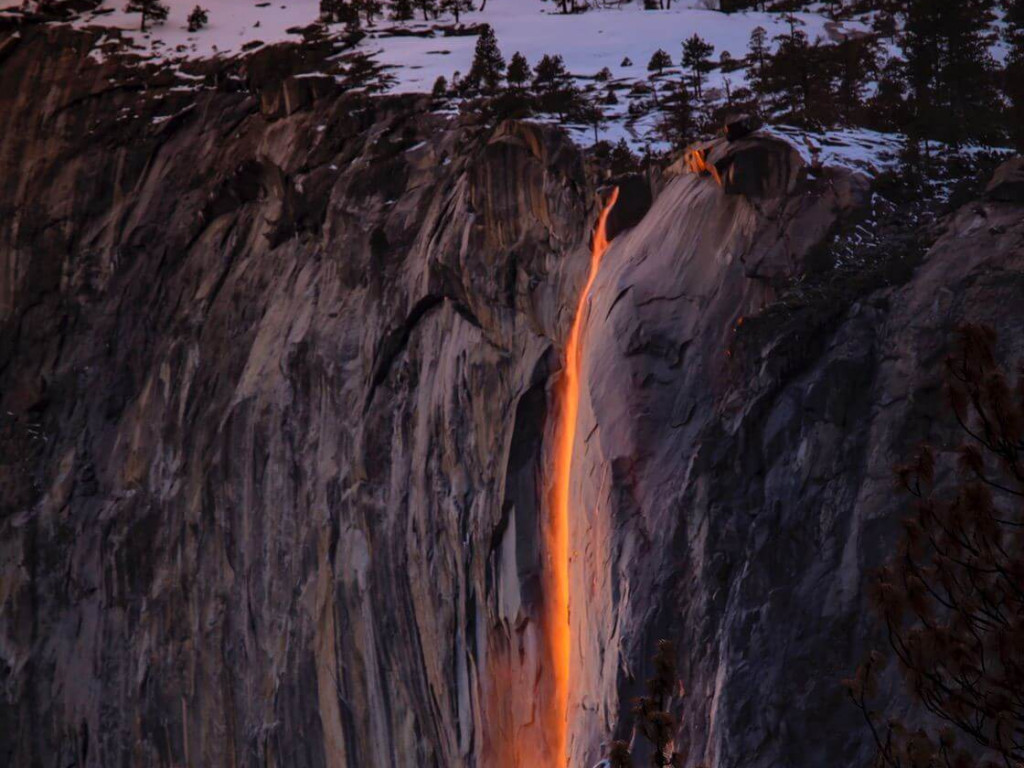 Nicely lit waterfall in the sunset that seems like lava